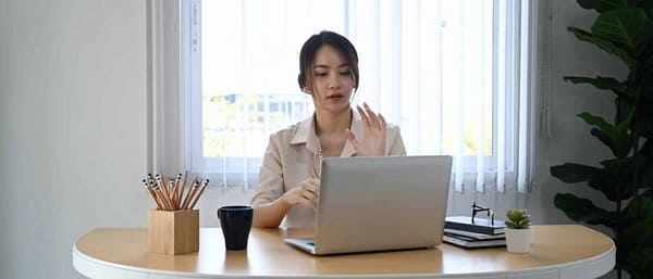 young-businesswoman-using-laptop-computer-virtual-video-conference-with-her-business-partner-.jpg young-businesswoman-using-laptop-computer-virtual-video-conference-with-her-business-partner-.jpg